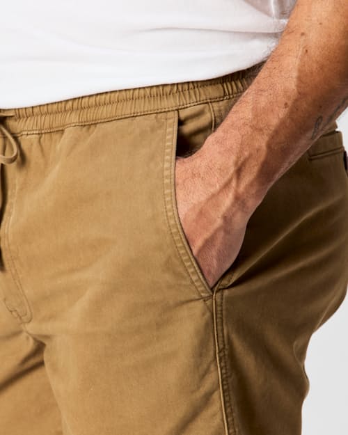 on model image of 365 Drawstring Short - 7"