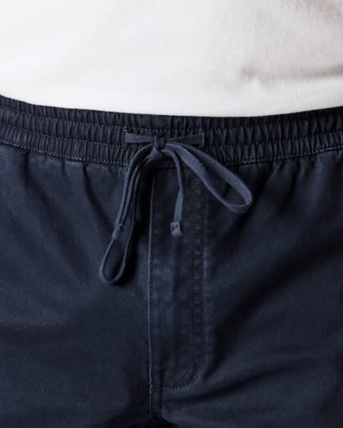 on model image of 365 Drawstring Short - 7"