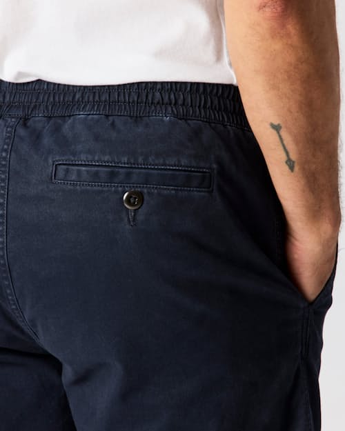on model image of 365 Drawstring Short - 7"