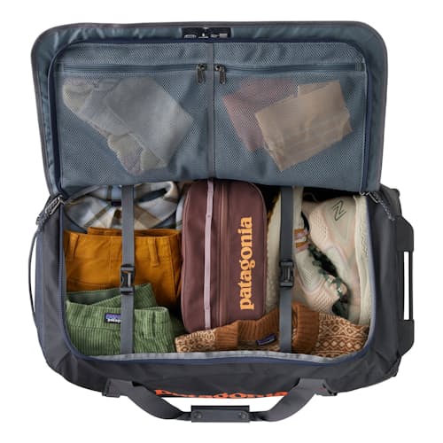 laydown image of Black Hole Wheeled Duffel - 70L