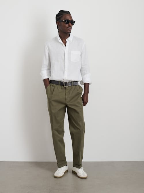 on model image of Standard Pleated Chino Pant