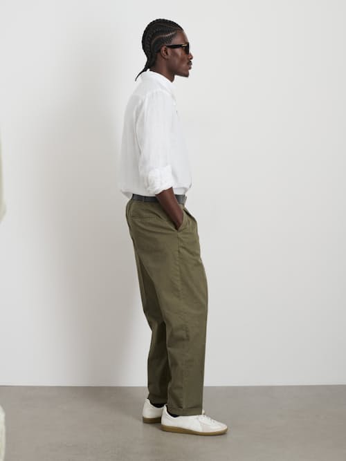 on model image of Standard Pleated Chino Pant