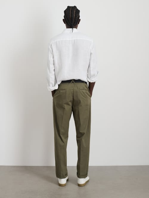 on model image of Standard Pleated Chino Pant