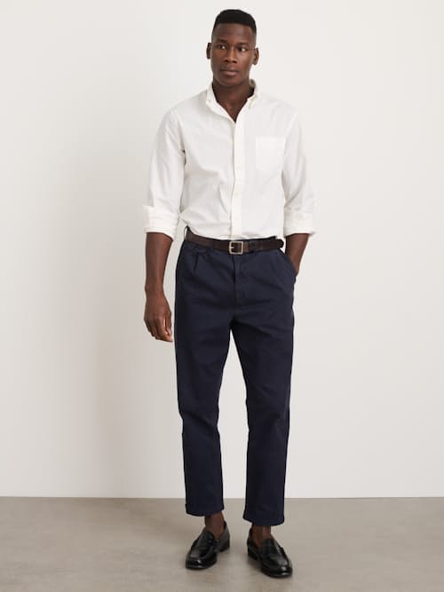 on model image of Standard Pleated Chino Pant