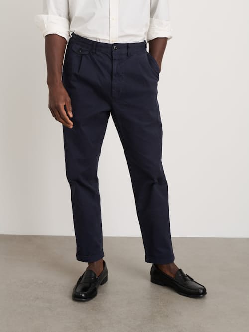 on model image of Standard Pleated Chino Pant