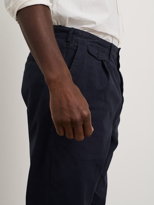 on model image of Standard Pleated Chino Pant