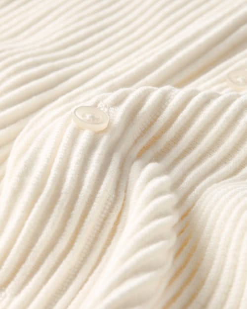 laydown detail image of Ribbed Button-Up Sweater Polo