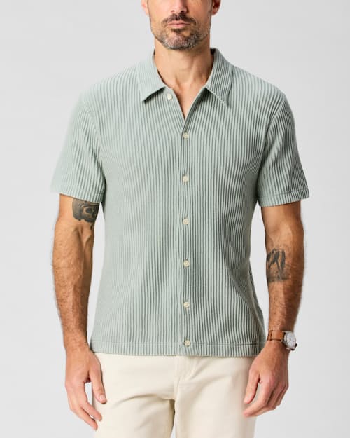 lifestyle image of Ribbed Button-Up Sweater Polo