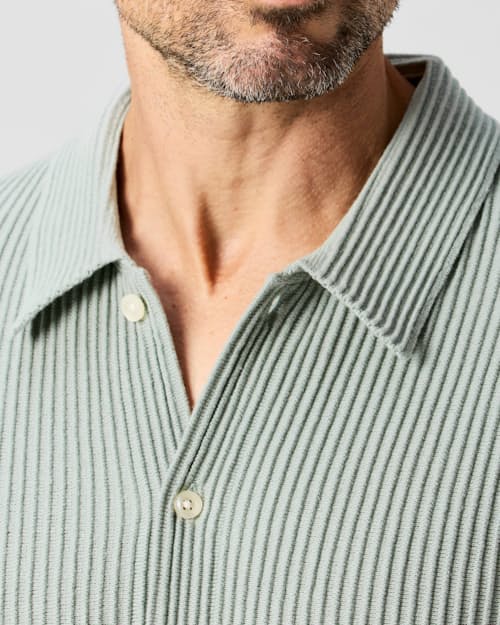 lifestyle image of Ribbed Button-Up Sweater Polo