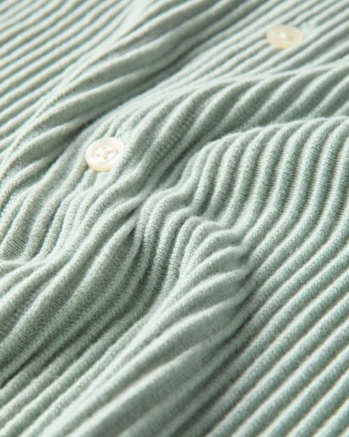 laydown detail image of Ribbed Button-Up Sweater Polo