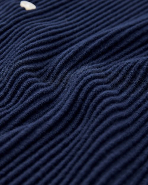 laydown detail image of Ribbed Button-Up Sweater Polo