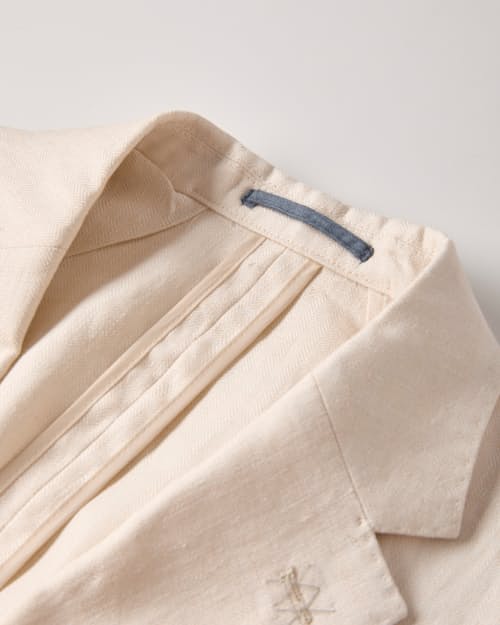 laydown detail image of The Stevens Linen Herringbone Blazer