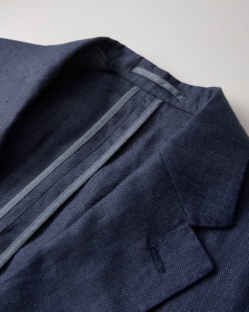 laydown detail image of The Stevens Linen Herringbone Blazer
