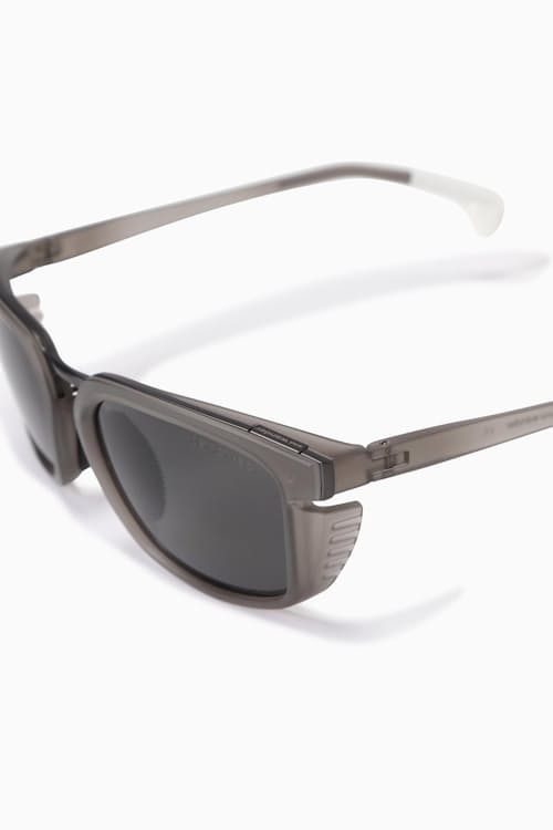 laydown detail image of District Vision x and wander Sunglasses
