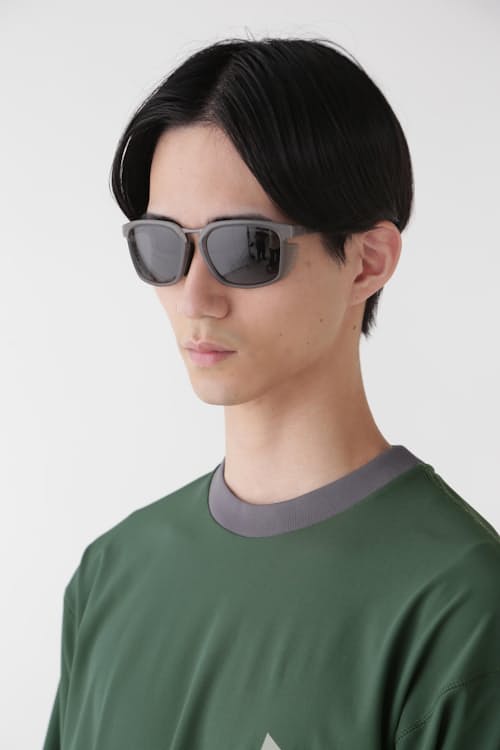 on model image of District Vision x and wander Sunglasses