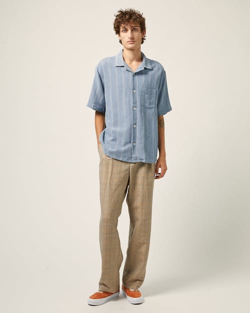 on model image of Striped Seersucker Camp Collar Short Sleeve Shirt
