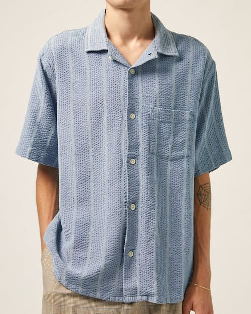 on model image of Striped Seersucker Camp Collar Short Sleeve Shirt