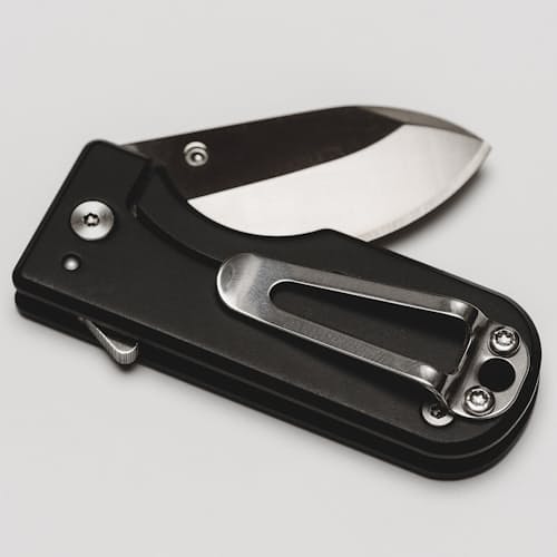 laydown image of Micro Blade Pocket Knife - Titanium
