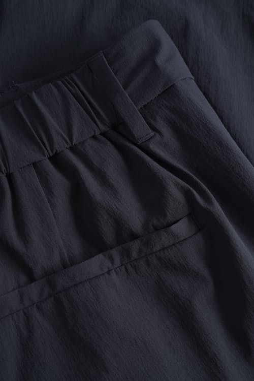 laydown detail image of Benn Travel Light Shorts
