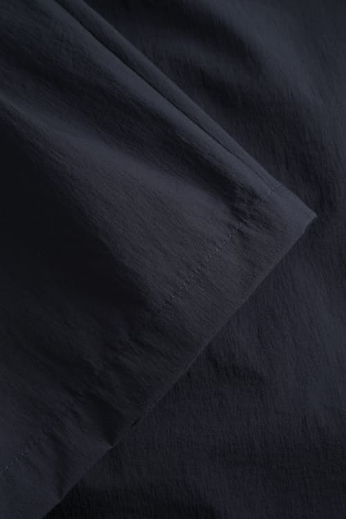 laydown detail image of Benn Travel Light Shorts