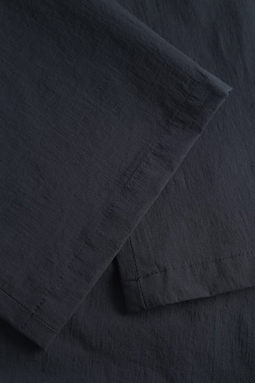 laydown detail image of Aaren Light Travel Pant