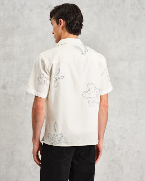 on model image of Didcot Floral Short Sleeve Shirt