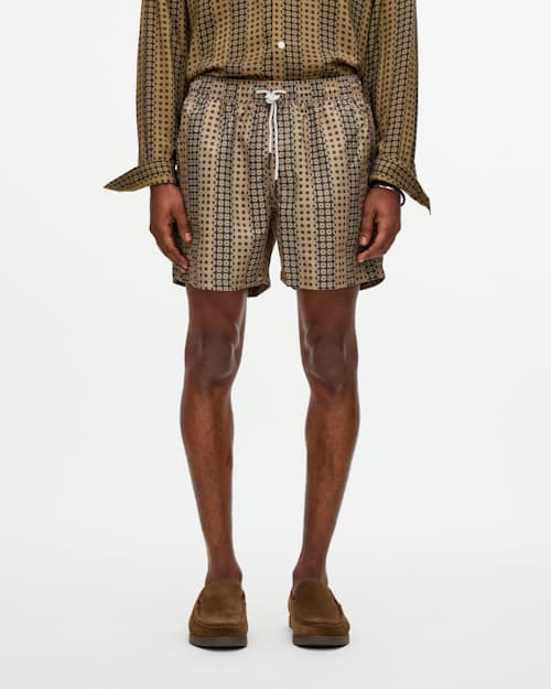 on model image of The Resort Swim Short - 5"