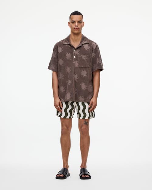on model image of The Resort Swim Short - 5"