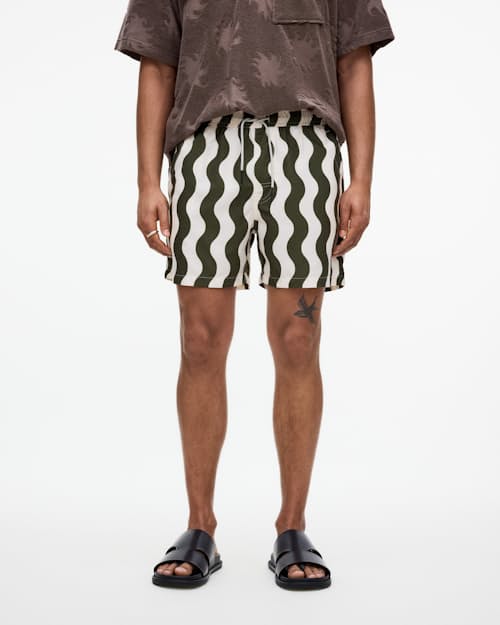on model image of The Resort Swim Short - 5"