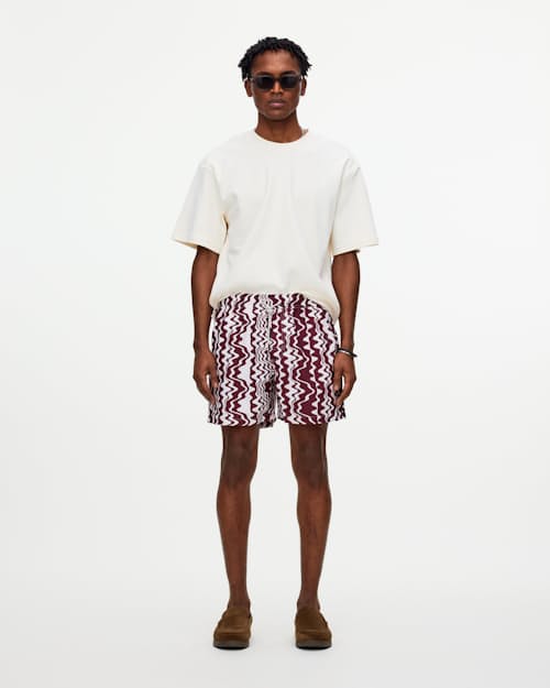 on model image of The Resort Swim Short - 5"