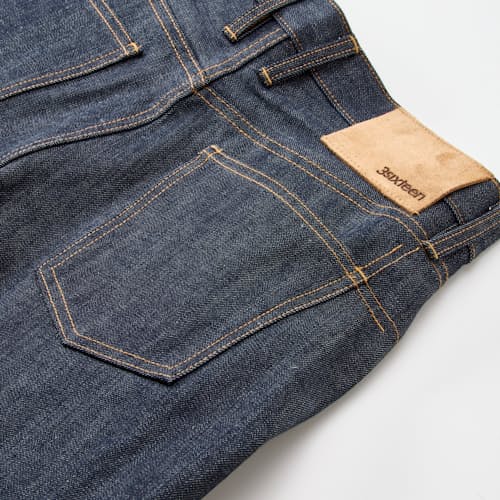 laydown detail image of Classic Tapered Selvedge Denim Jeans