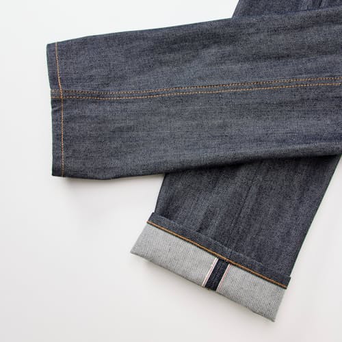 laydown detail image of Classic Tapered Selvedge Denim Jeans