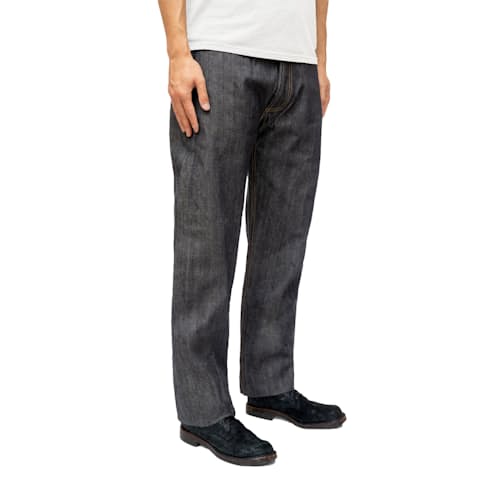 on model image of Classic Tapered Selvedge Denim Jeans