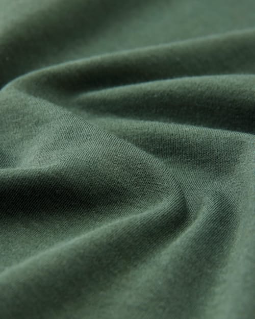 laydown detail image of AloeKnit Polo Shirt