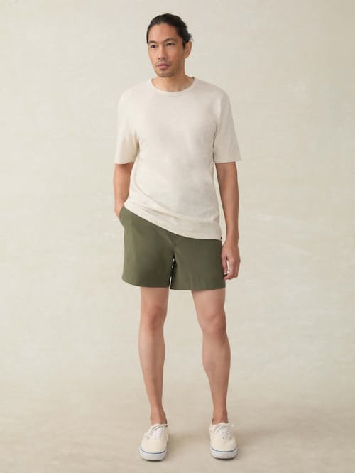 on model image of All Day 4-Way Stretch Shorts - 7"