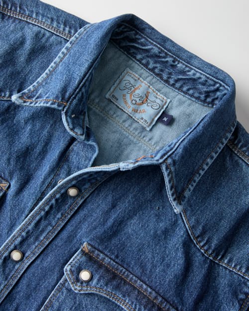 laydown detail image of Modern Western Pearlsnap Selvedge Denim Shirt