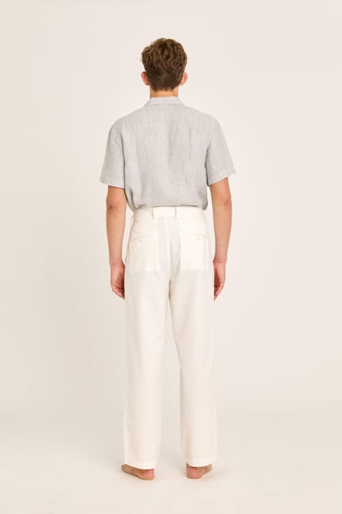 on model image of Carona Double Pleated Canvas Pants