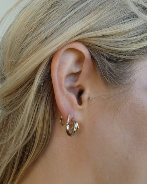 lifestyle image of Women's Two Tone Hoop Earrings