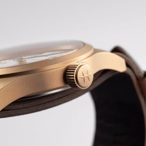 laydown detail image of Khaki Field Mechanical Bronze 38mm Watch