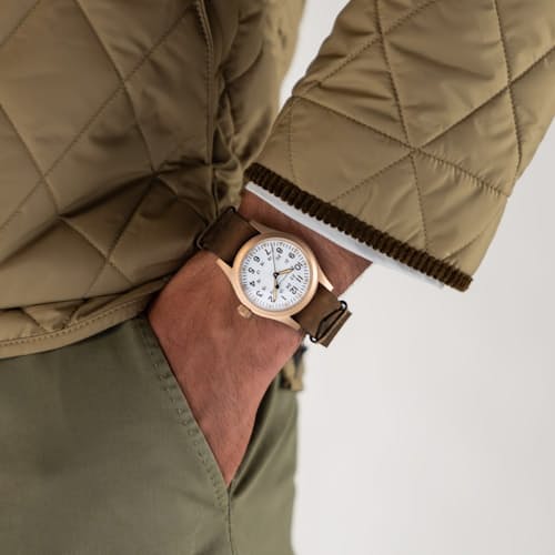 on model image of Khaki Field Mechanical Bronze 38mm Watch