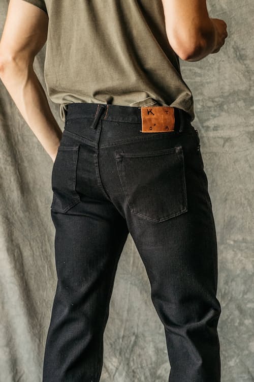lifestyle image of The Hammer Straight Stretch Selvedge Denim Jeans