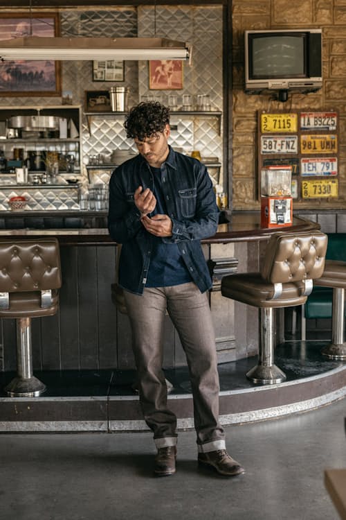 lifestyle image of The Hammer Straight Stretch Selvedge Denim Jeans