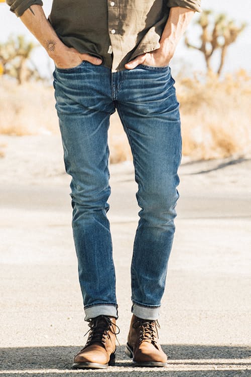 lifestyle image of The Scissors Slim Tapered Stretch Selvedge Denim Jeans
