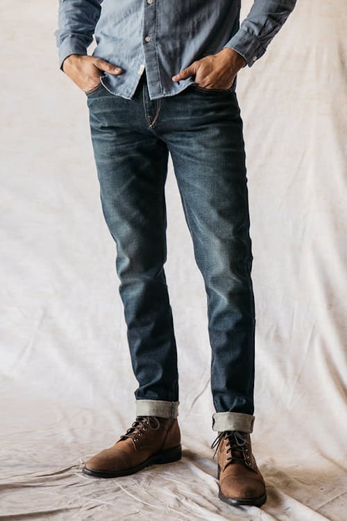 on model image of The Scissors Slim Tapered Stretch Selvedge Denim Jeans
