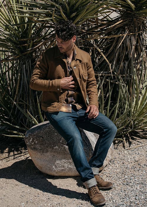 lifestyle image of The Scissors Slim Tapered Stretch Selvedge Denim Jeans