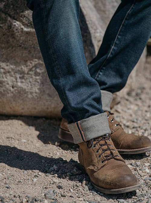 lifestyle image of The Scissors Slim Tapered Stretch Selvedge Denim Jeans