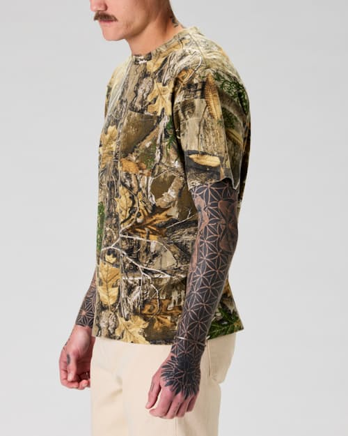 on model image of Realtree® Camo Pocket T-Shirt