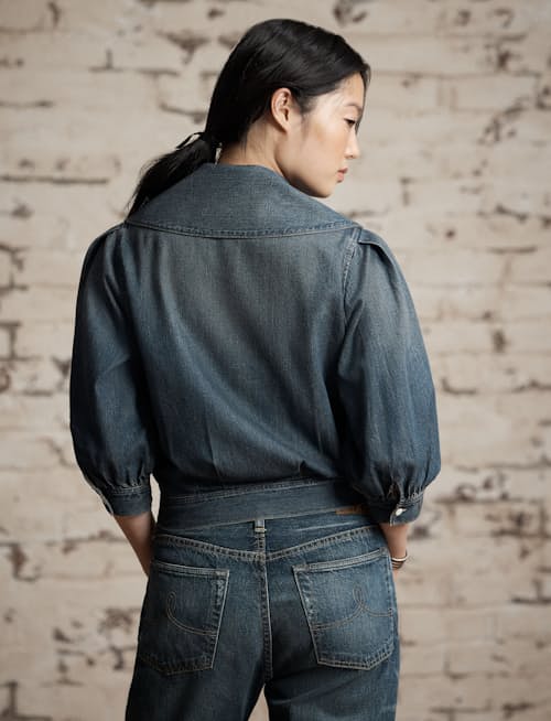 on model image of Women's Denim Rocha Wrap Blouse