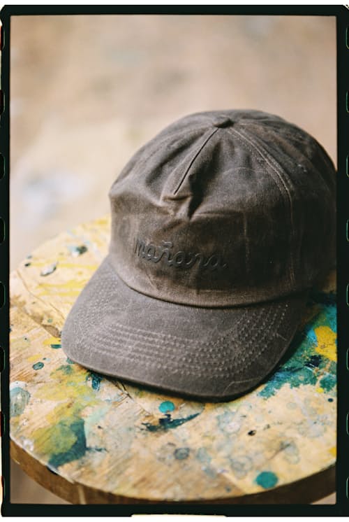 lifestyle image of Waxed Canvas Logo Strapback hat