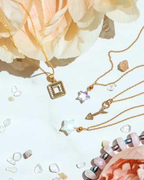 lifestyle image of Women's Moonstone Star Necklace